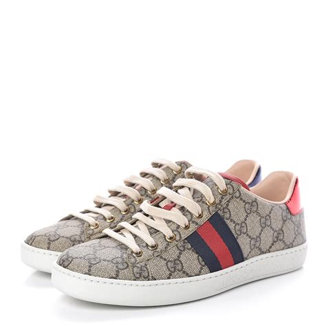 white and gold gucci sneakers|gucci gg supreme sneakers.